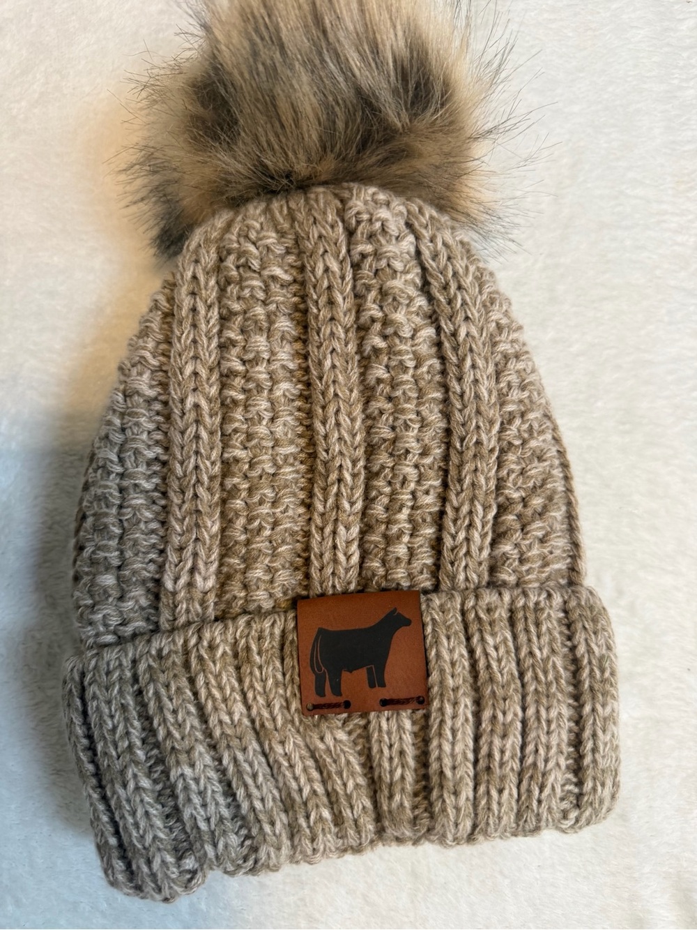 CC Exclusives Cable Knit Beanie Faux Fur Pom Pom Plush Lined Cow Patch Taupe